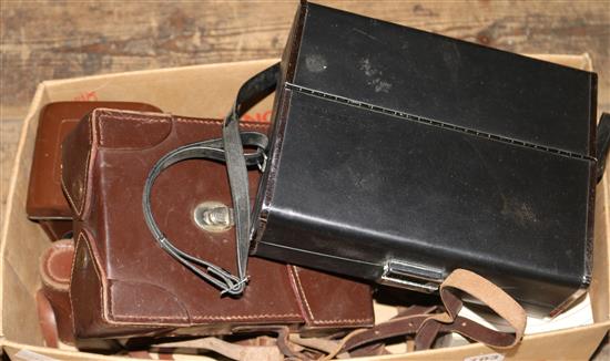 Collection of leather cased cameras